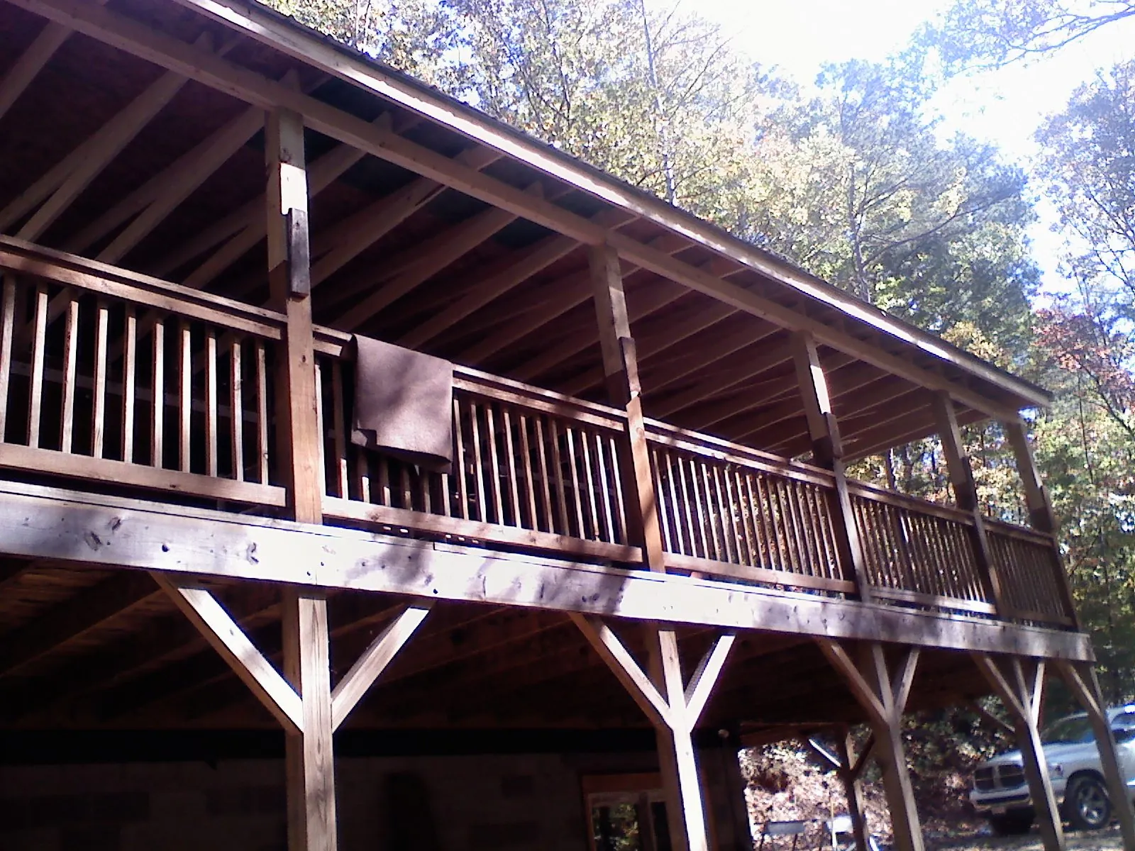 Timber framing under a new elevated porch and deck — Roof Leak Repair in Pleasanton by Roofing Brothers